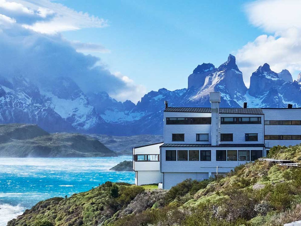 The Explora Torres del Paine lodge above Lake Pehoé, with the granite peaks of the Paine massif behind it