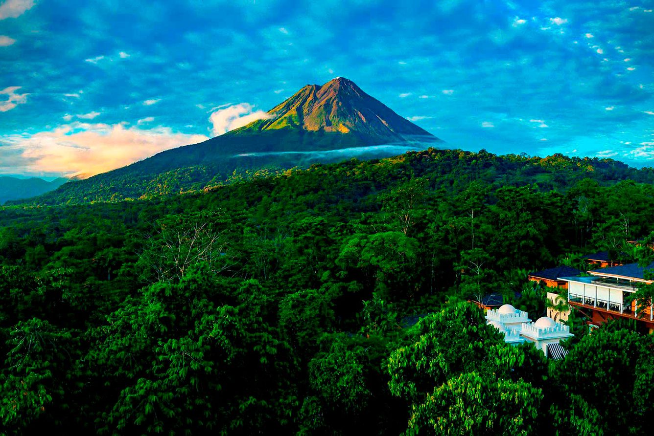 Arenal Volcano rising above the rainforest, seen from Nayara Springs in La Fortuna