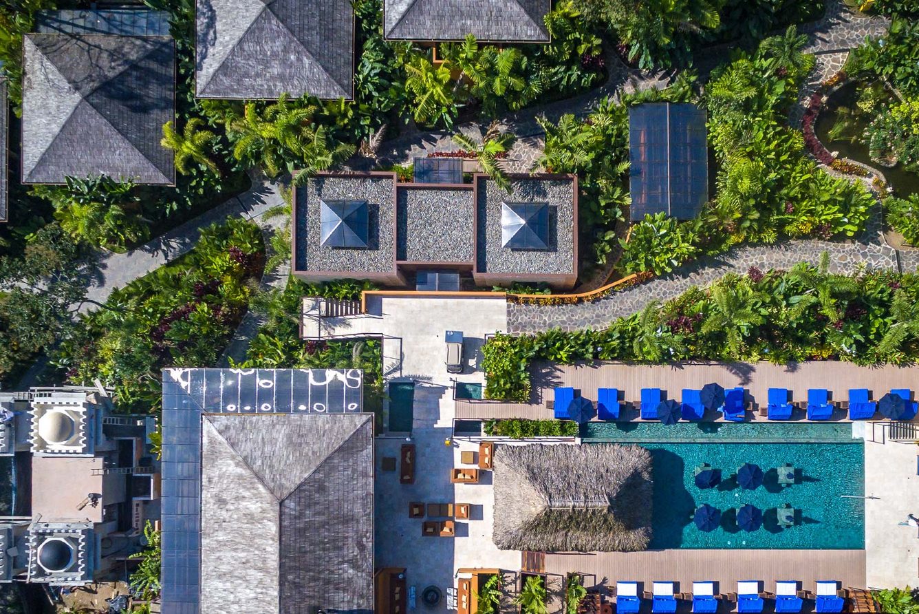 The pool and grounds at Nayara Springs, La Fortuna