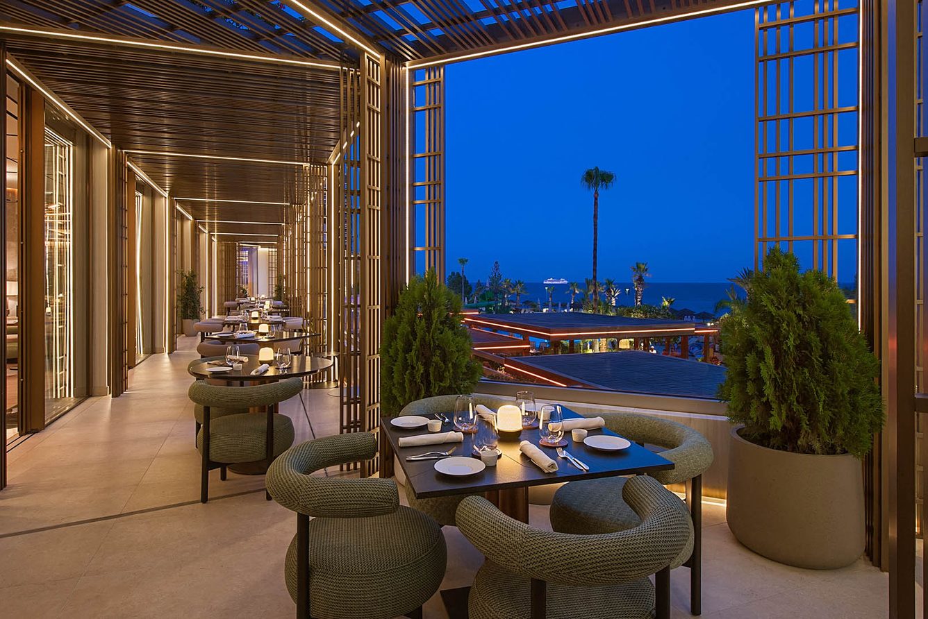 The Sera restaurant terrace at dusk, Four Seasons Hotel Limassol