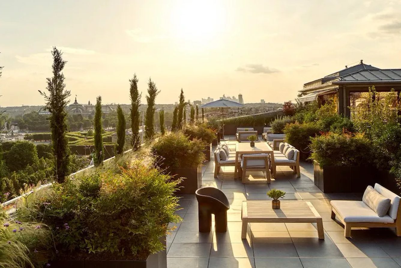 The Belle Étoile penthouse terrace at Le Meurice overlooking the Paris rooftops