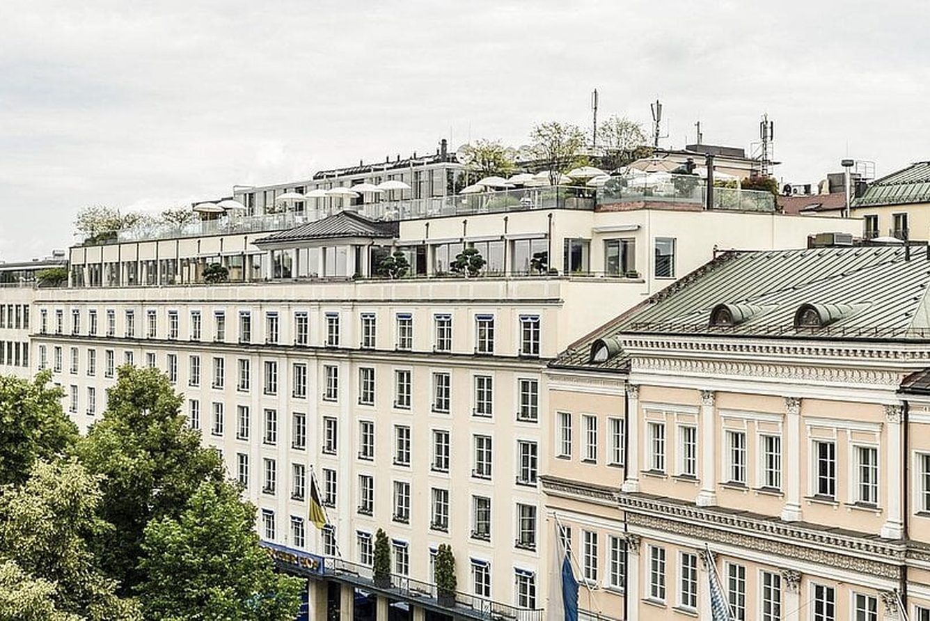 The Hotel Bayerischer Hof on Promenadeplatz in Munich, seen across the old town rooftops