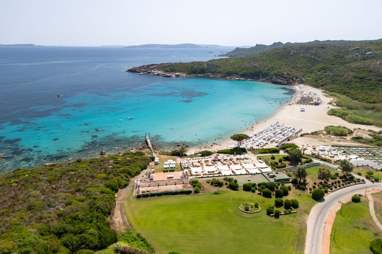 Aerial view of a turquoise cove on the Sardinian coast, Italy