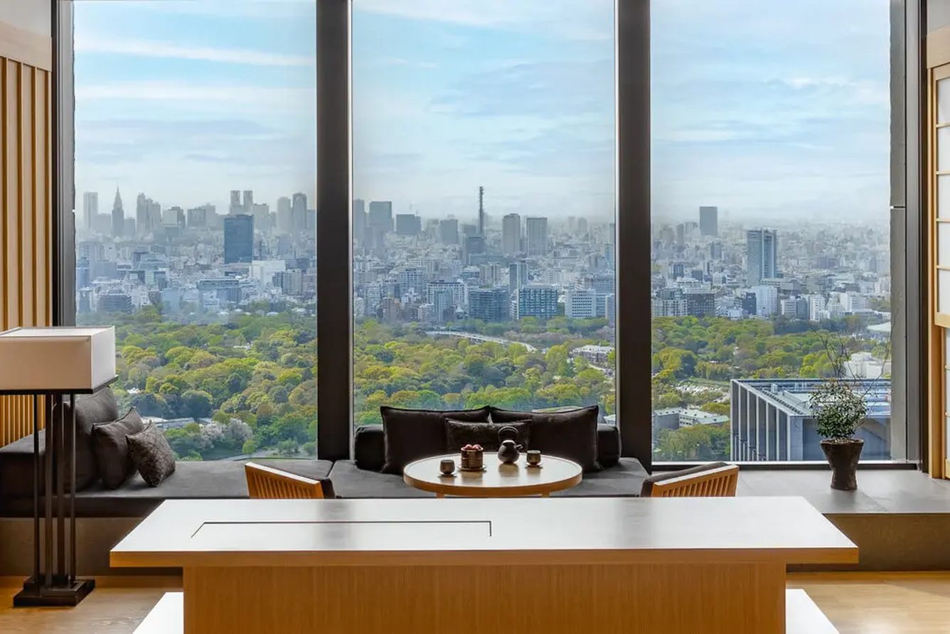 A guest room at Aman Tokyo looking out over the city skyline
