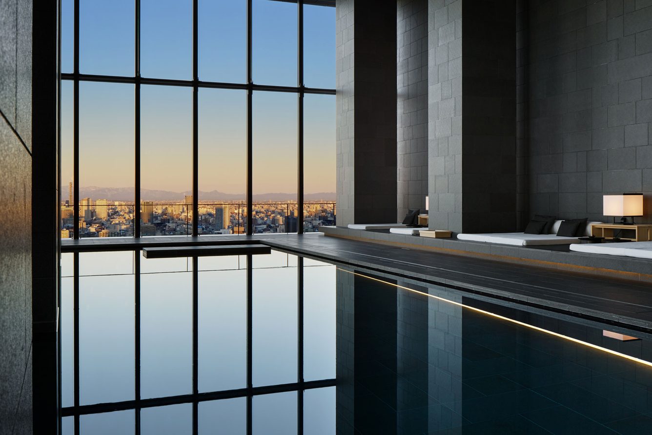 The wellness level at Aman Tokyo in the Otemachi Tower, with the indoor pool above the city