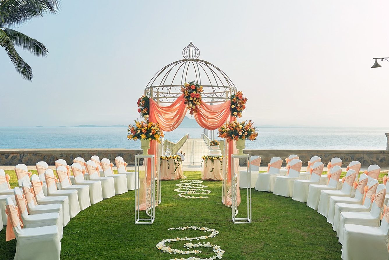 The seafront lawn at the Eastern & Oriental Hotel, set for a garden ceremony facing the Penang Strait
