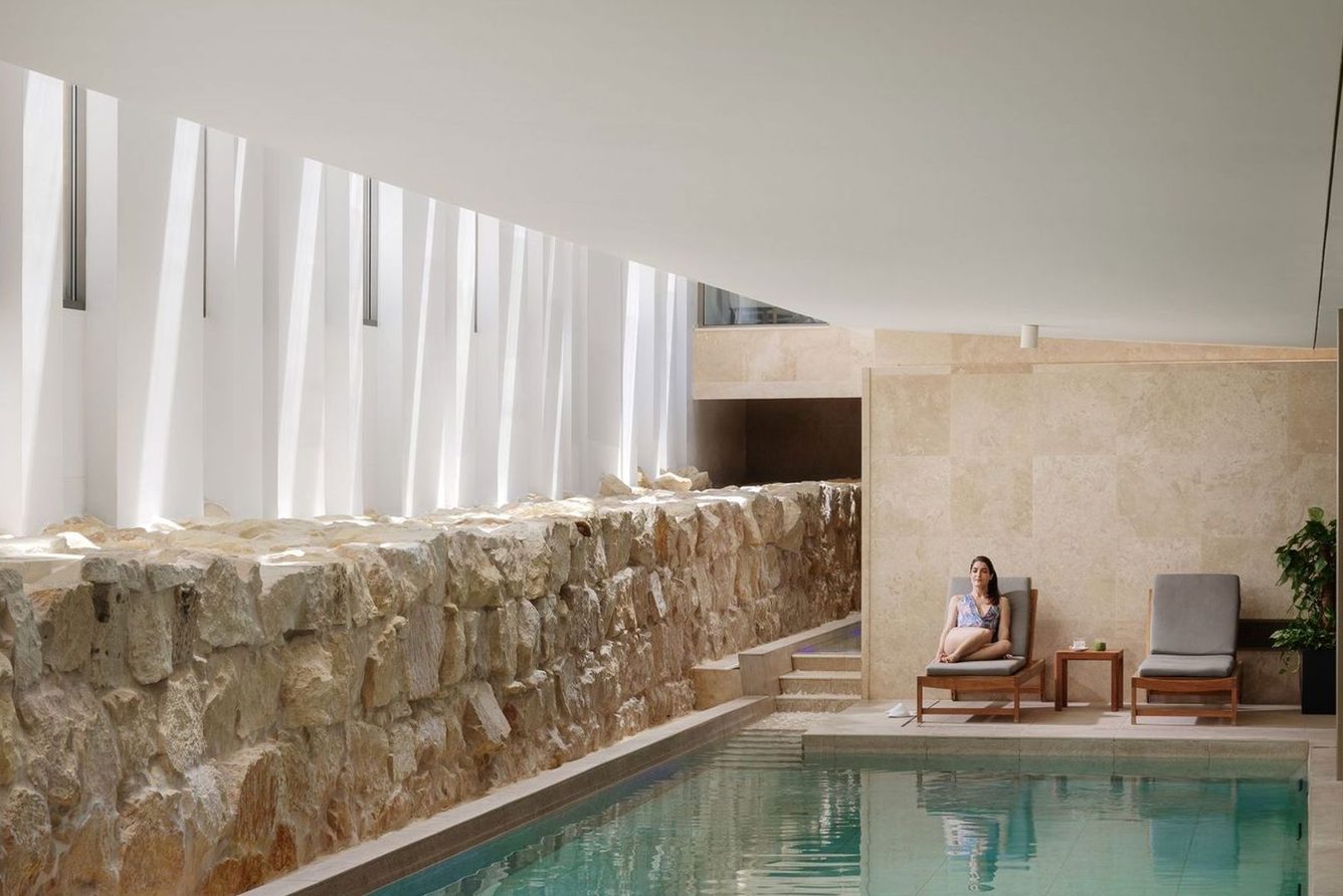 The indoor pool of the Phoenicia Spa by Deep Nature, set into Valletta's bastion walls