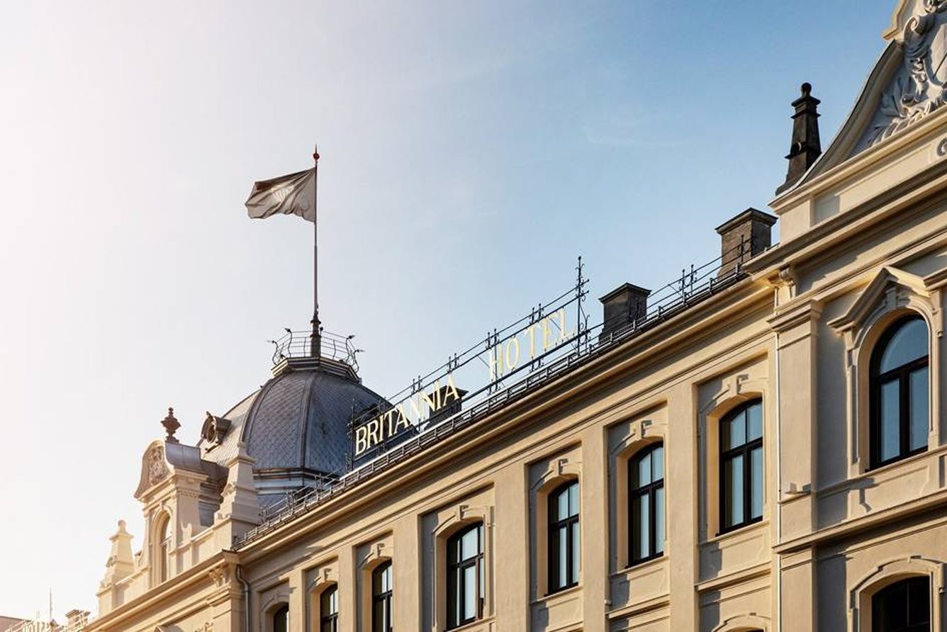 The cream facade and cupola of Britannia Hotel on Dronningens gate in Trondheim