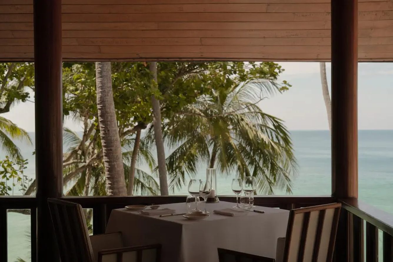 A table set for dinner at Arva, Amanpuri's Italian restaurant, overlooking the Andaman Sea
