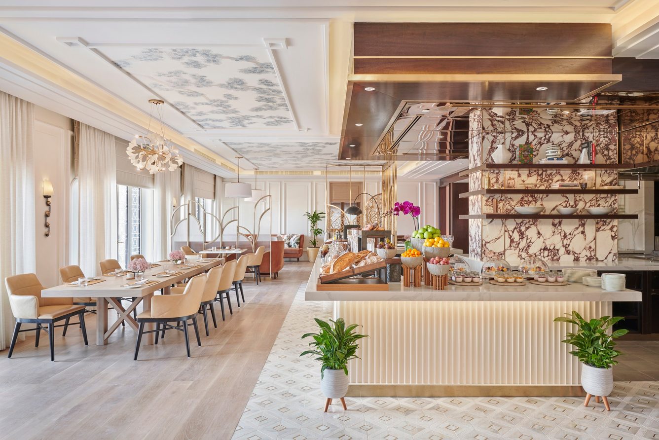 Restaurant interior with buffet counters and ornate palace detailing at Emirates Palace Mandarin Oriental